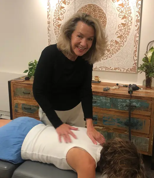 Chiropractor San Anselmo CA Ann Rhame Adjusting Patient